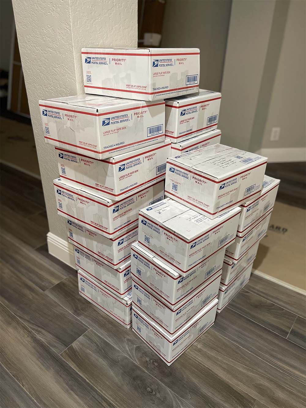Books in postal boxes ready to be mailed
